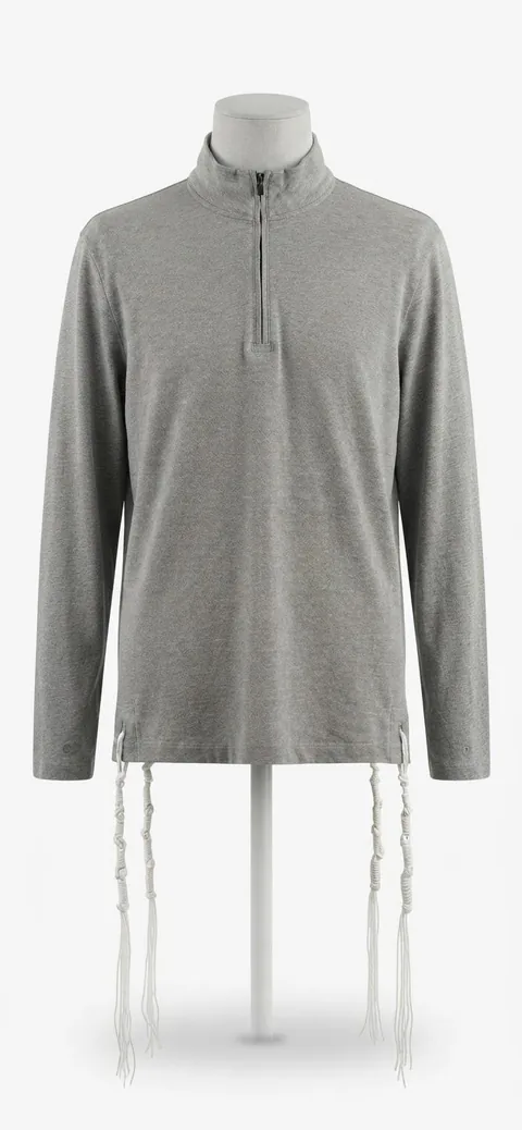 Piece 9: tzitzit tied into a heather grey quarter-zip, on a mannequin
