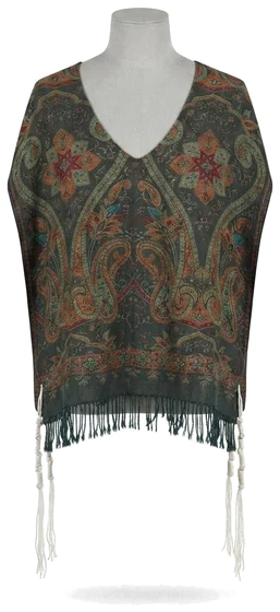 Piece 16: tzitzit tied into a green and rust paisley cloth, on a mannequin