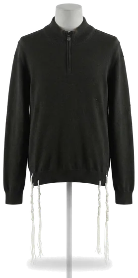 Piece 27: tzitzit tied into a black quarter-zip knit, on a mannequin