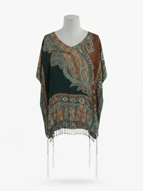 Piece 29: tzitzit tied into a forest and rust ornate paisley cloth, on a mannequin